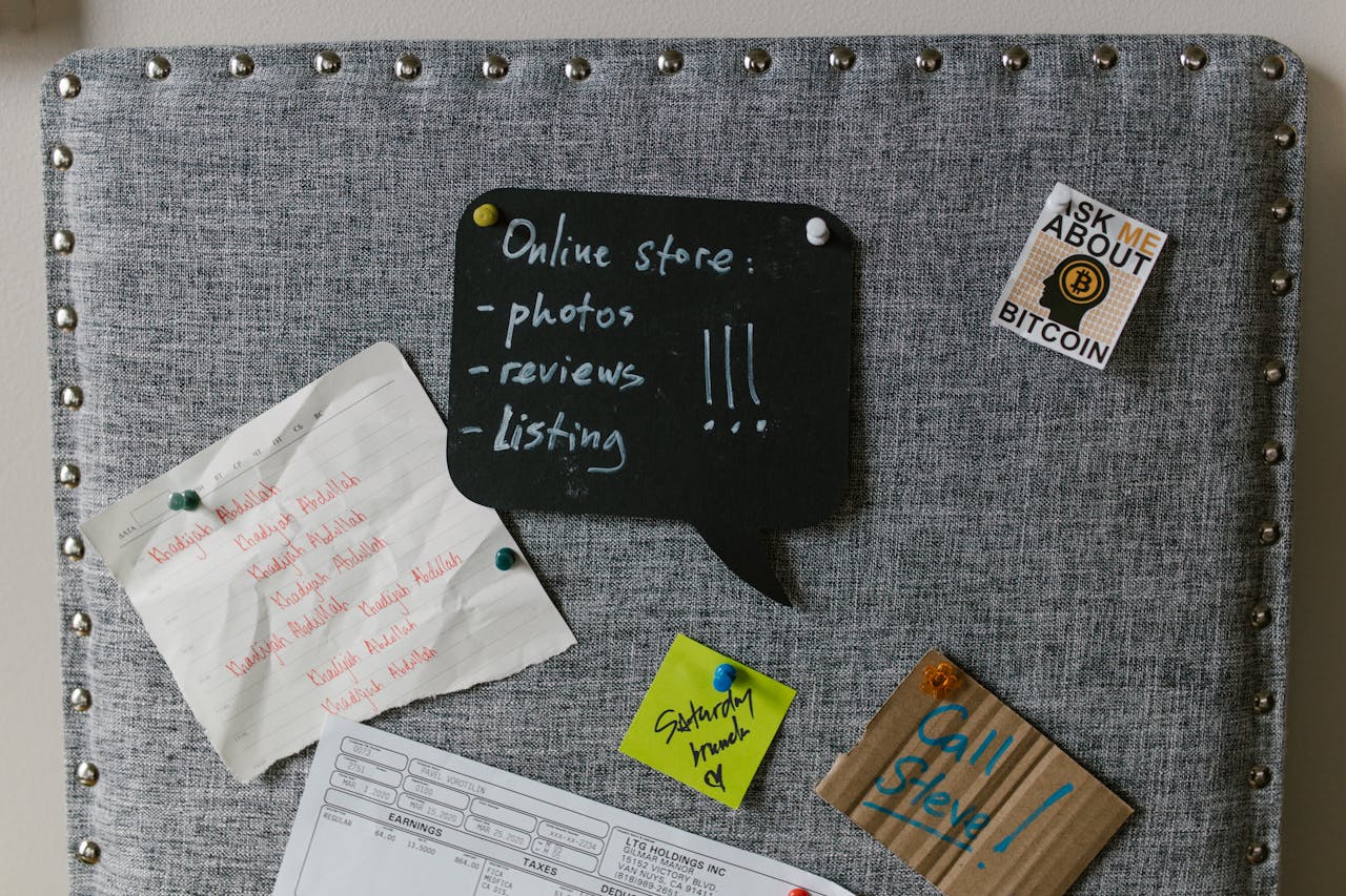 A detailed bulletin board with notes and reminders about business tasks.